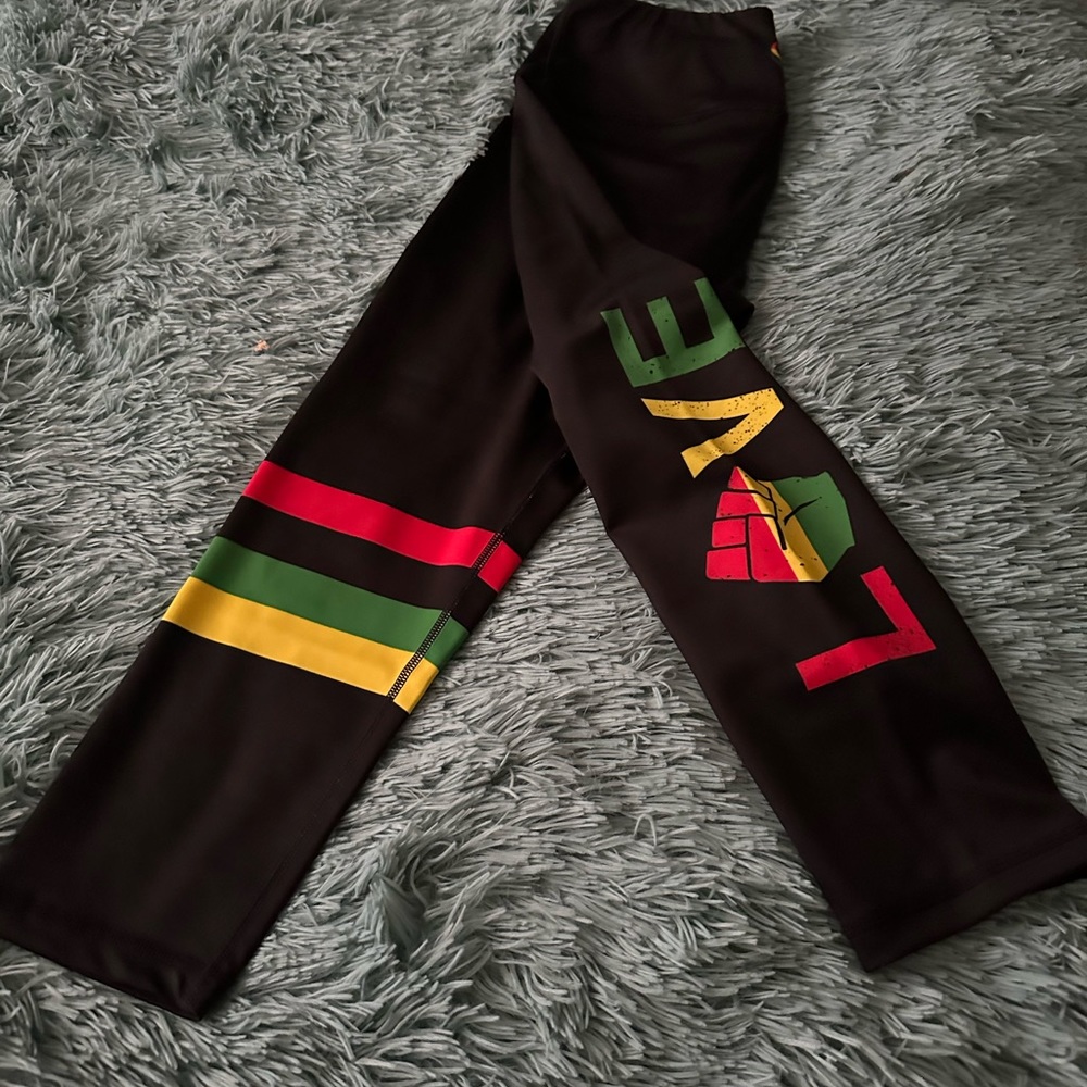 Vibrant Black Leggings with Colorful Stripes